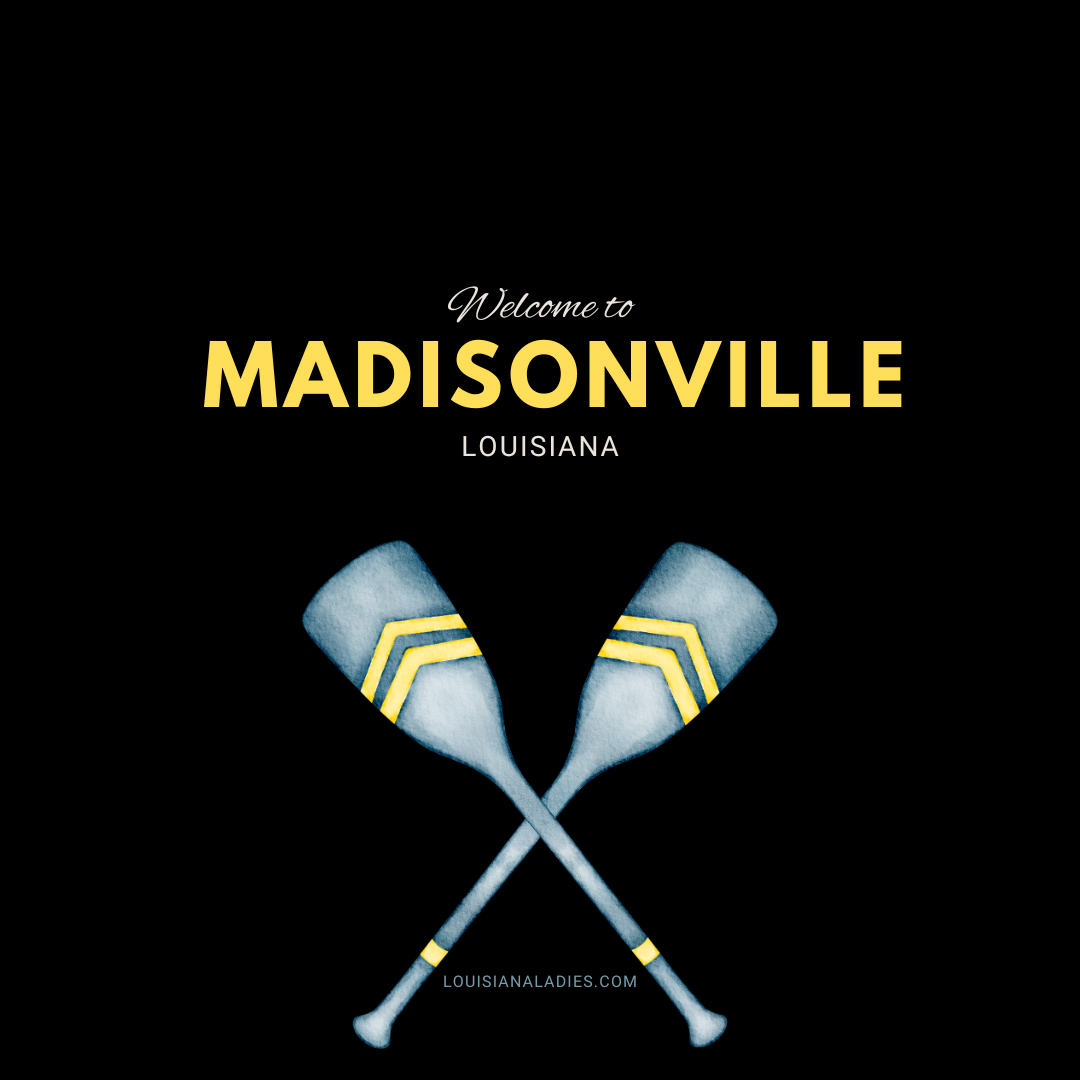 Image of two boat oar in the color of gray with yellow stripes and the words Welcome to Madisonville Louisiana and LouisianaLadies.com