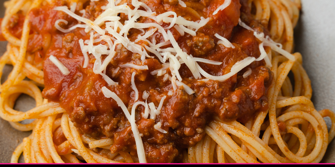 A picture of spaghetti noodles and sauce and a banner that reads Greater New Orleans Food Banks