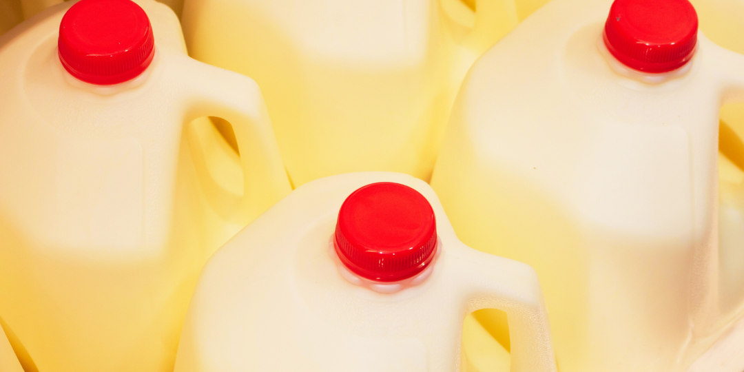 image of gallons of mile and a banner reading Southwest Louisiana Food banks