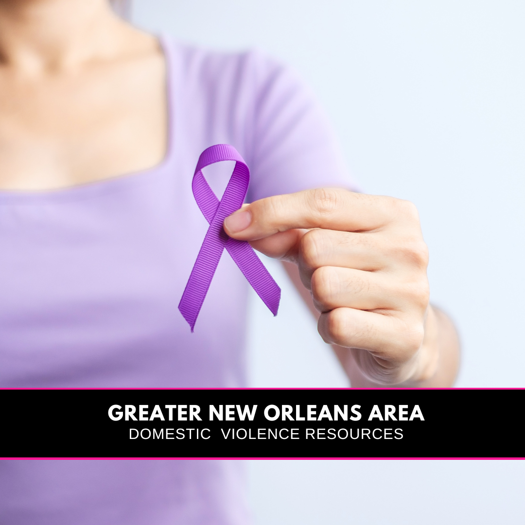 a Woman in a purple shirt holding a purple ribbon and a banner that reads Greater New Orleans Area Domestic Violence Resources