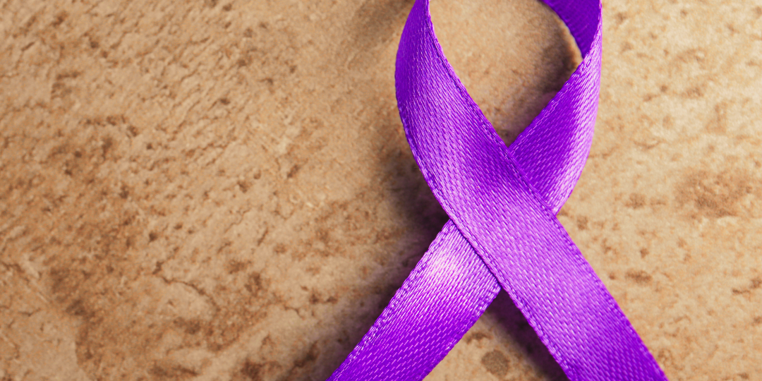 a purple ribbon and a banner reading Northeast Louisiana Domestic Violence Resources